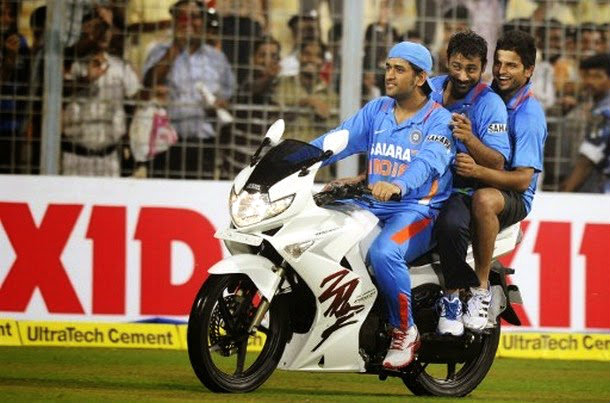 mahendra singh dhoni on his bike